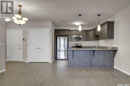 323 1715 Badham Boulevard, Regina, SK - Indoor Photo Showing Kitchen With Stainless Steel Kitchen