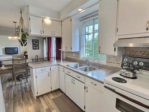 Kitchen - 23 Rue Champoux, Notre-Dame-Du-Nord, QC - Indoor Photo Showing Kitchen With Double Sink