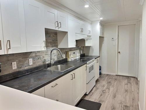 Kitchen - 23 Rue Champoux, Notre-Dame-Du-Nord, QC - Indoor Photo Showing Kitchen