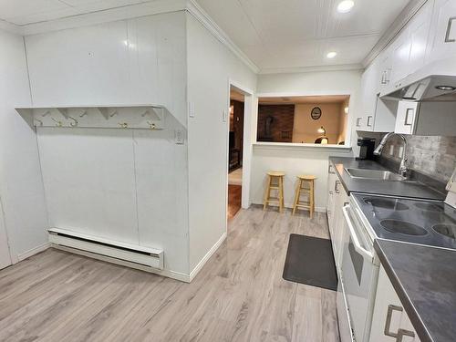 Kitchen - 23 Rue Champoux, Notre-Dame-Du-Nord, QC - Indoor Photo Showing Other Room