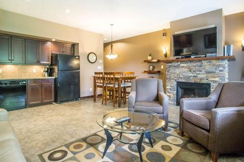 513 - 500 Bighorn Boulevard, Radium Hot Springs, BC - Indoor With Fireplace