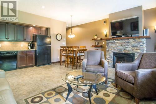 500 Bighorn  Boulevard Unit# 513, Radium Hot Springs, BC - Indoor With Fireplace