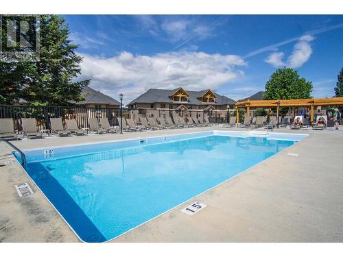 500 Bighorn  Boulevard Unit# 513, Radium Hot Springs, BC - Outdoor With In Ground Pool With Backyard