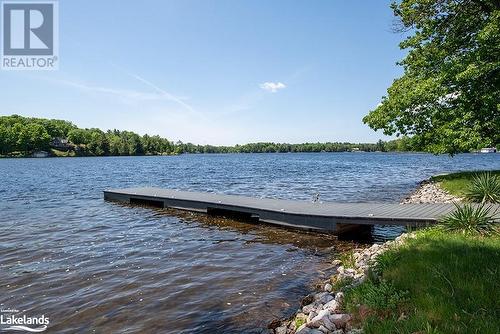 Sandy shoreline and South West View - 2066 Beman Point Lane, Coldwater, ON - Outdoor With Body Of Water With View