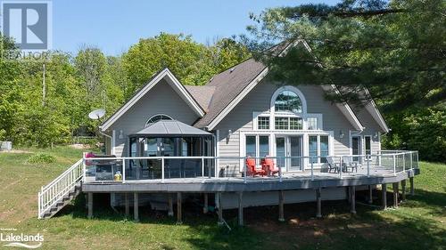 Expansive decking for everyone to enjoy. - 2066 Beman Point Lane, Coldwater, ON - Outdoor With Deck Patio Veranda