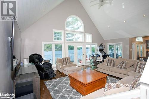 Great Room view from the stairs going to Loft - 2066 Beman Point Lane, Coldwater, ON - Indoor Photo Showing Living Room