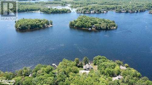 Southwest exposure over bay south of the Trent Severn Waterway. You can See The Waterway to the right of the dock. - 2066 Beman Point Lane, Coldwater, ON - Outdoor With Body Of Water With View