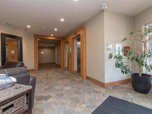 214-1395 Bear Mountain Pkwy, Langford, BC - Indoor With Fireplace