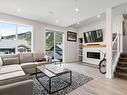 60-1240 Alpine Road, Sun Peaks, BC  - Indoor Photo Showing Living Room With Fireplace 