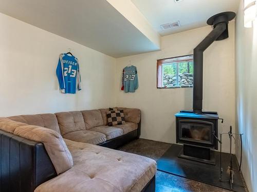 292 Orchard Lake Road, Barriere, BC - Indoor Photo Showing Living Room With Fireplace