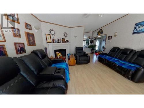 10874 261 Road, Fort St. John, BC - Indoor Photo Showing Living Room With Fireplace