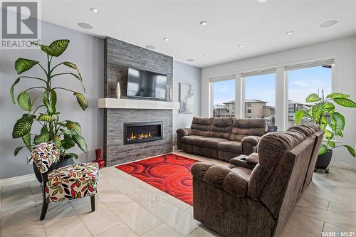 5129 Aviator Crescent, Regina, SK - Indoor Photo Showing Living Room With Fireplace