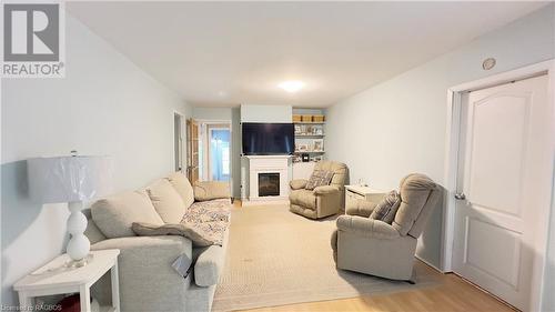 14 Victoria Street, Inverhuron, ON - Indoor Photo Showing Living Room With Fireplace