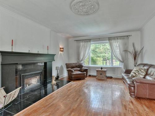 Salon - 743 Rue Principale, Lachute, QC - Indoor Photo Showing Living Room With Fireplace