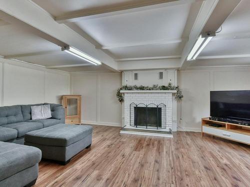 Salle familiale - 743 Rue Principale, Lachute, QC - Indoor Photo Showing Living Room With Fireplace