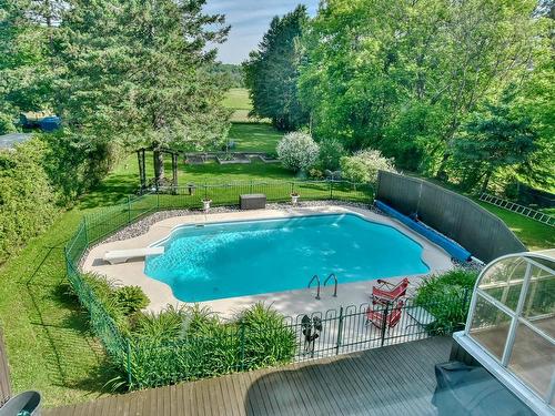 Cour - 743 Rue Principale, Lachute, QC - Outdoor With In Ground Pool With Backyard