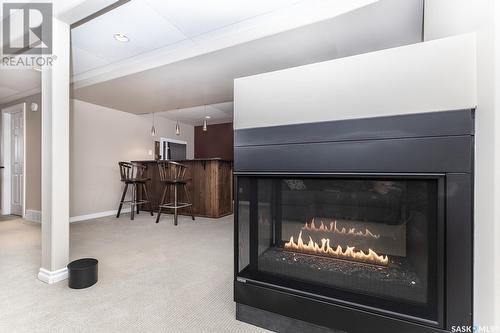215 13Th Avenue E, Watrous, SK - Indoor Photo Showing Living Room With Fireplace