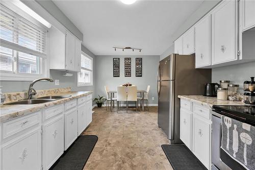 28 Forest Hill Crescent, Hamilton, ON - Indoor Photo Showing Kitchen With Double Sink