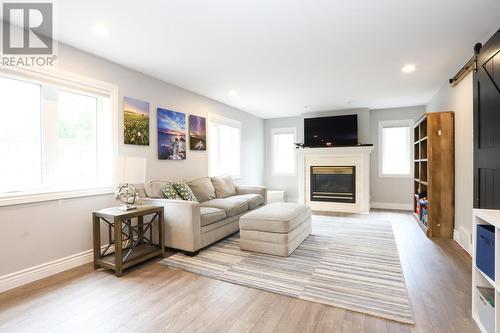 125 Louise Ave, Sault Ste. Marie, ON - Indoor Photo Showing Living Room With Fireplace