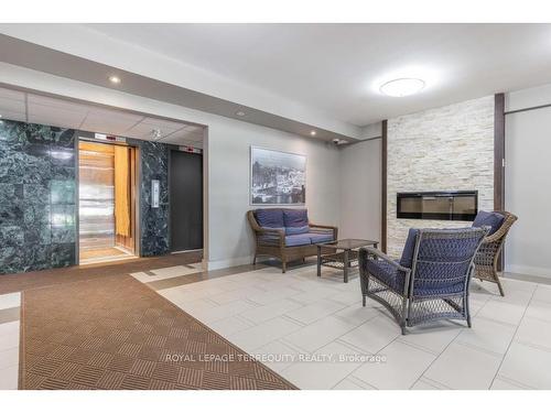 908-6400 Huggins St, Niagara Falls, ON - Indoor With Fireplace