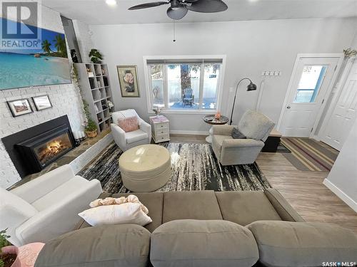 348 Powell Crescent, Swift Current, SK - Indoor Photo Showing Living Room With Fireplace