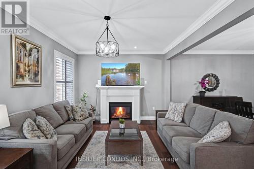 88 Faris Street, Bradford West Gwillimbury, ON - Indoor Photo Showing Living Room With Fireplace