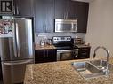 2709 - 4070 Confederation Parkway, Mississauga, ON  - Indoor Photo Showing Kitchen With Stainless Steel Kitchen With Double Sink With Upgraded Kitchen 