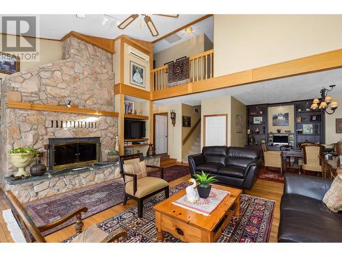 9222 Smith Road, Vernon, BC - Indoor Photo Showing Living Room With Fireplace