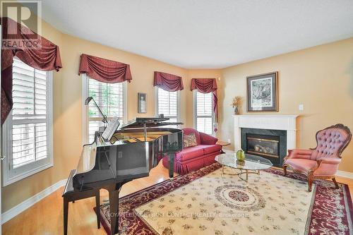 10 Tropicana Gardens, Brampton, ON - Indoor Photo Showing Living Room With Fireplace