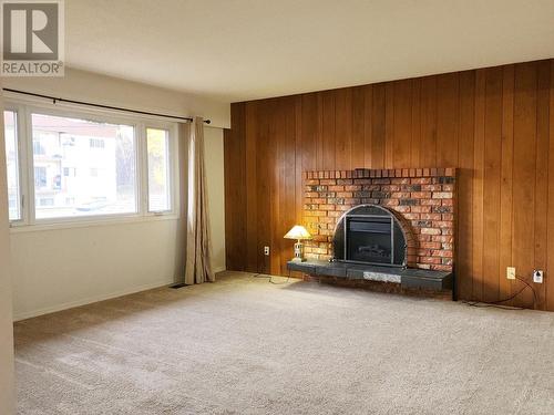 318 5Th Avenue, Burns Lake, BC - Indoor Photo Showing Living Room With Fireplace