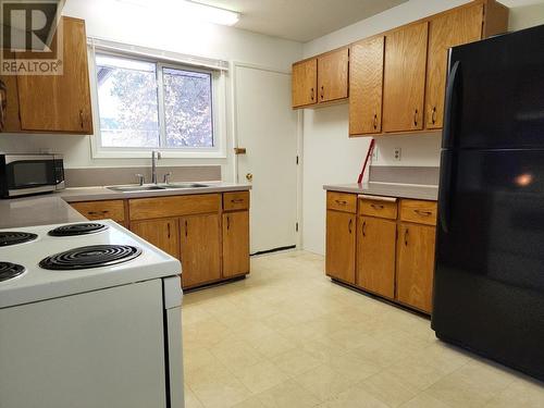 318 5Th Avenue, Burns Lake, BC - Indoor Photo Showing Kitchen With Double Sink