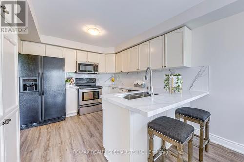 7403 Magistrate Terrace, Mississauga, ON - Indoor Photo Showing Kitchen With Double Sink