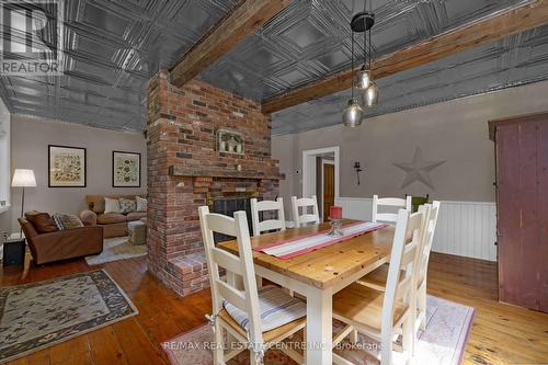 5955 Third Line, Erin, ON - Indoor Photo Showing Dining Room With Fireplace