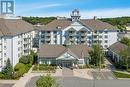 410 - 285 Steamship Bay Road, Gravenhurst, ON  - Outdoor With Balcony With Facade 