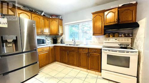 127 - 30 Venetian Crescent, Toronto, ON - Indoor Photo Showing Kitchen With Double Sink