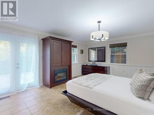 109 Highland Lane, Richmond Hill (Mill Pond), ON - Indoor Photo Showing Bedroom With Fireplace