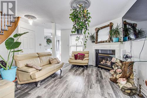 3 Shaina Court, Barrie (Painswick South), ON - Indoor Photo Showing Living Room With Fireplace