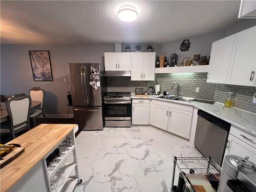 5753 Morrison Street|Unit #303, Niagara Falls, ON - Indoor Photo Showing Kitchen With Double Sink