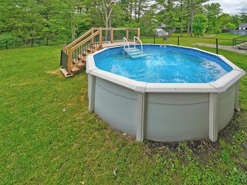 Pool - 12 Rue Des Colibris, Sainte-Clotilde, QC - Outdoor With Above Ground Pool With Backyard