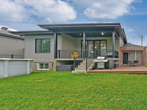 Back facade - 12 Rue Des Colibris, Sainte-Clotilde, QC - Outdoor With Deck Patio Veranda