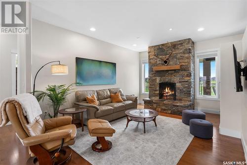 115 Mission Ridge Road, Aberdeen Rm No. 373, SK - Indoor Photo Showing Living Room With Fireplace