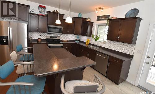 219 Mccallum Way, Saskatoon, SK - Indoor Photo Showing Kitchen With Double Sink