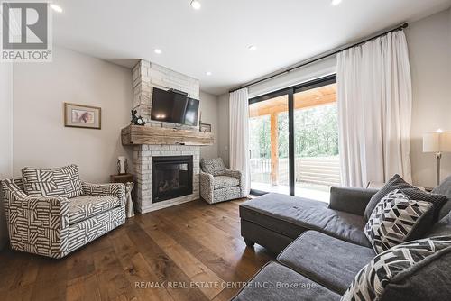 11 Cockshutt Road, Brant, ON - Indoor Photo Showing Living Room With Fireplace