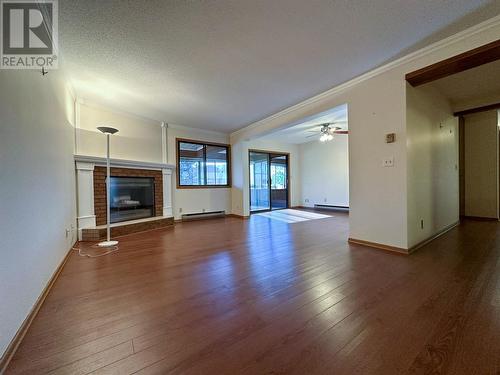 1075 Bernard Avenue Unit# 312, Kelowna, BC - Indoor Photo Showing Living Room With Fireplace