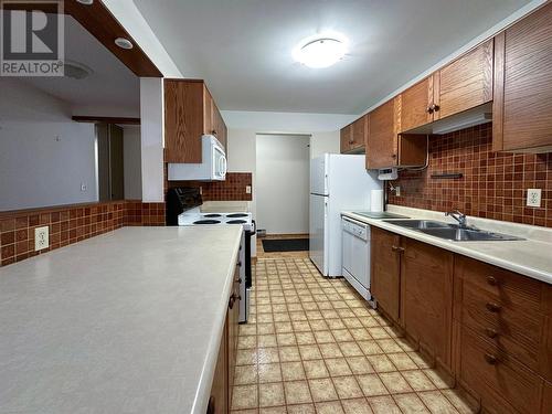 1075 Bernard Avenue Unit# 312, Kelowna, BC - Indoor Photo Showing Kitchen With Double Sink