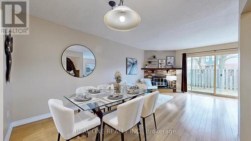 139 - 270 Timberbank Boulevard, Toronto, ON - Indoor Photo Showing Dining Room With Fireplace