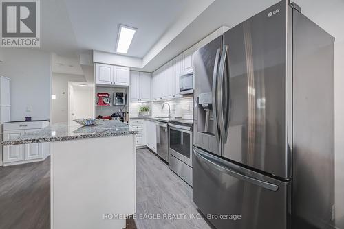 118 - 510 Kingbird Grove, Toronto, ON - Indoor Photo Showing Kitchen With Upgraded Kitchen