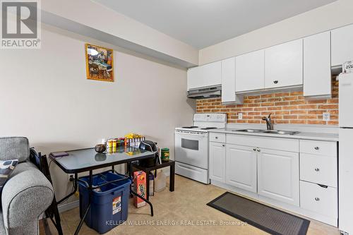 409 - 310 Kingsdale Avenue, Kingston, ON - Indoor Photo Showing Kitchen With Double Sink
