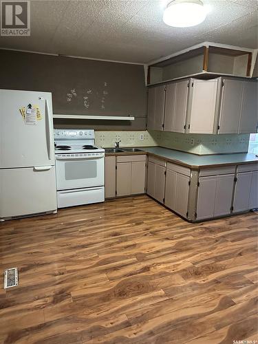 883 River Street W, Prince Albert, SK - Indoor Photo Showing Kitchen With Double Sink