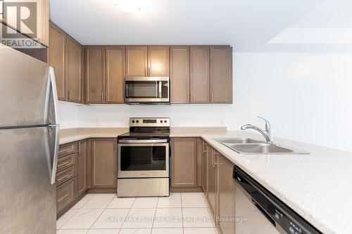 136 - 77 Diana Avenue, Brantford, ON - Indoor Photo Showing Kitchen With Double Sink